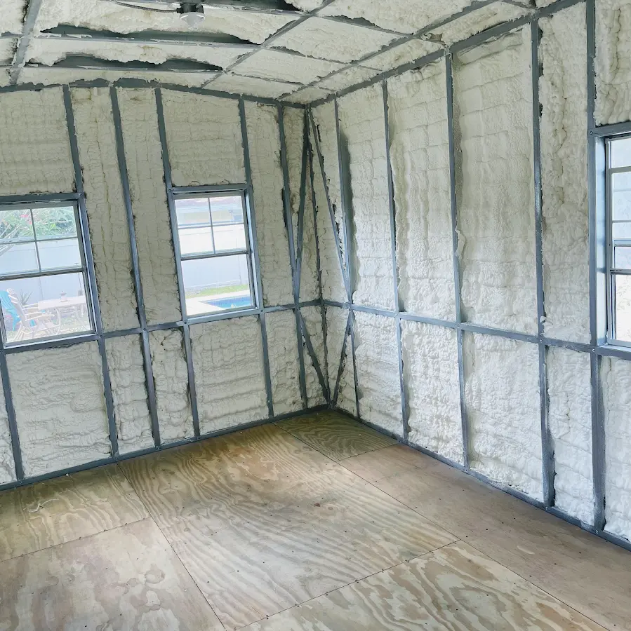 Closed-cell spray foam insulation applied to wall cavities in a residential project in Ocean Pointe